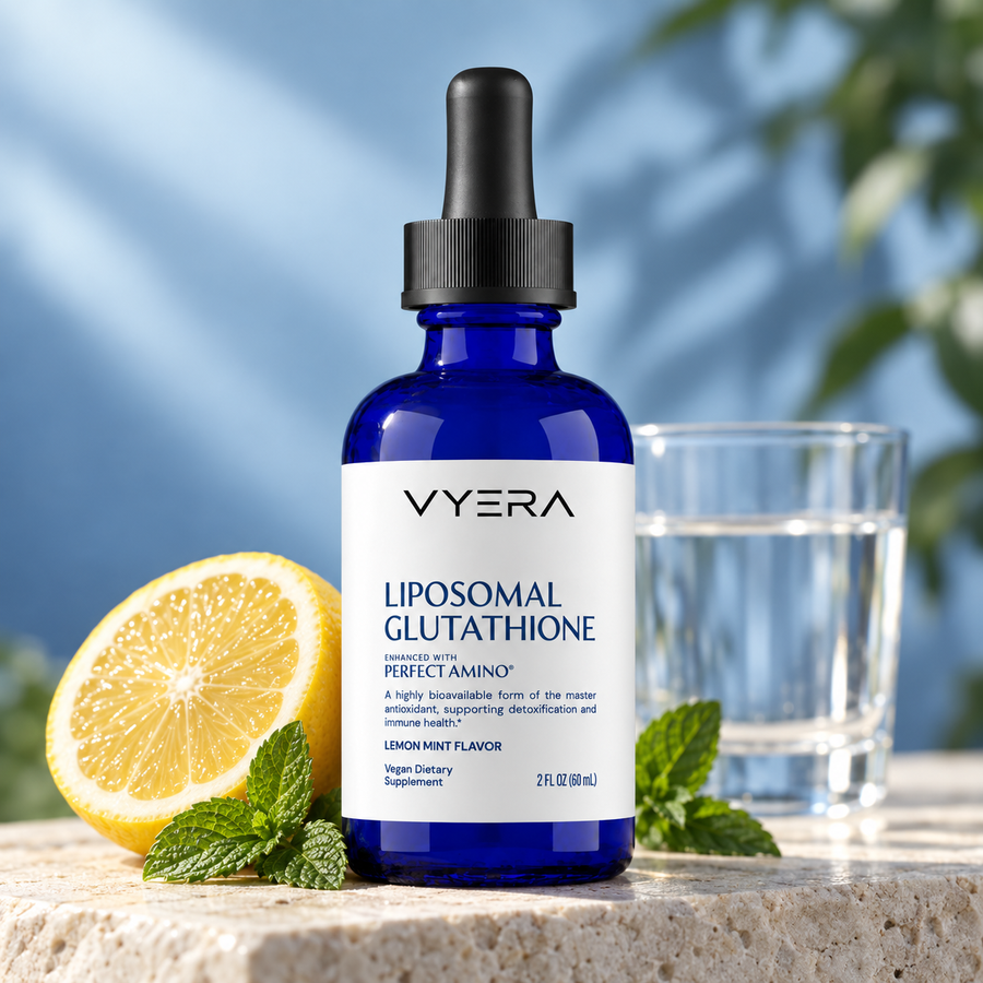 Vyera Liposomal Glutathione bottle with lemon, mint and a glass of water